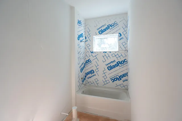 an empty room with windows