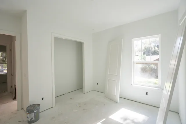 an empty room with windows