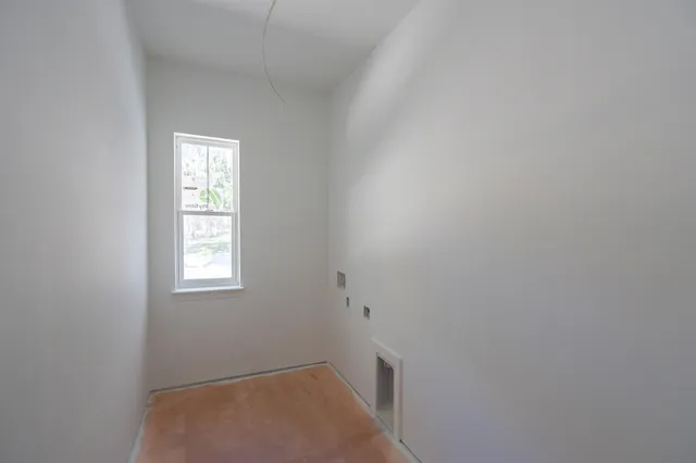 a view of a room with natural light