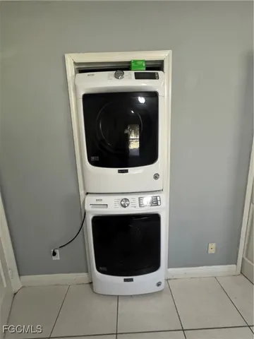 a bathroom with a toilet sink and shower