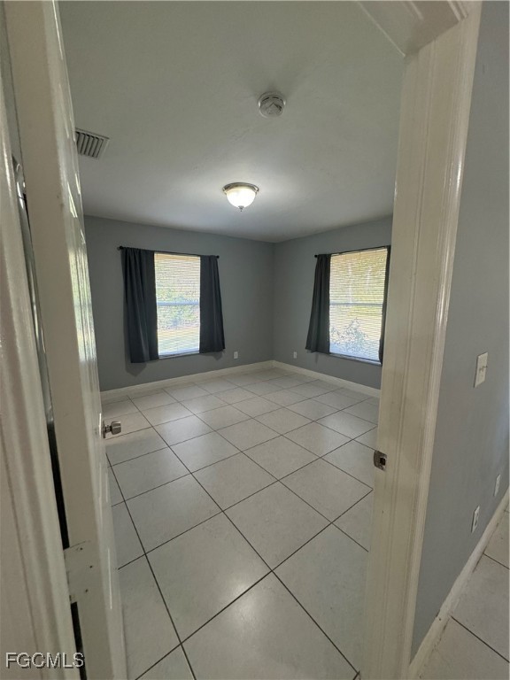 291 16th Street Northeast, Unit 1 Naples, FL 34120 - Photo 20 of 21 a view of empty room