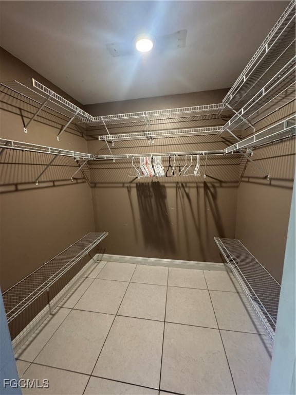 291 16th Street Northeast, Unit 1 Naples, FL 34120 - Photo 4 of 21 a view of a room with racks