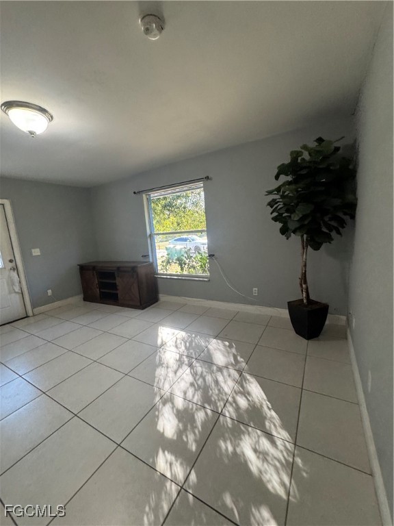 291 16th Street Northeast, Unit 1 Naples, FL 34120 - Photo 6 of 21 a vase of flowers sitting on a table