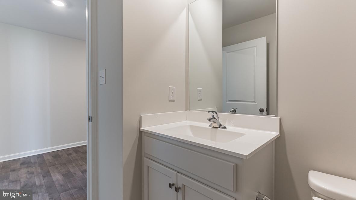 101 Whitman Lane Woodbine, NJ 08270 - Photo 21 of 29 a bathroom with a sink and a mirror