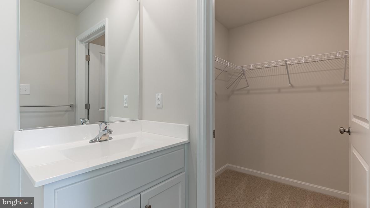 101 Whitman Lane Woodbine, NJ 08270 - Photo 5 of 29 a bathroom with a sink and a mirror