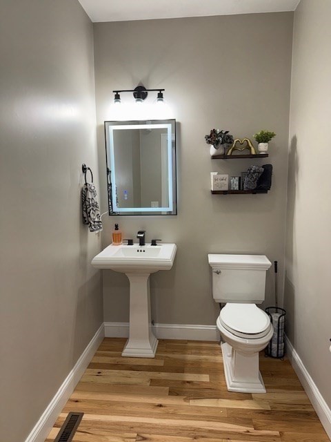 5 Deer Hill Road Oxford, MA 01537 - Photo 11 of 37 a bathroom with a toilet sink and mirror
