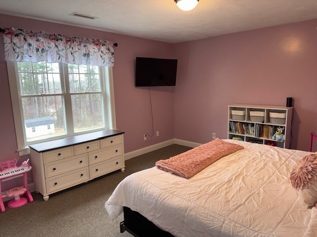 5 Deer Hill Road Oxford, MA 01537 - Photo 13 of 37 a bedroom with a bed and a flat tv screen on the dresser