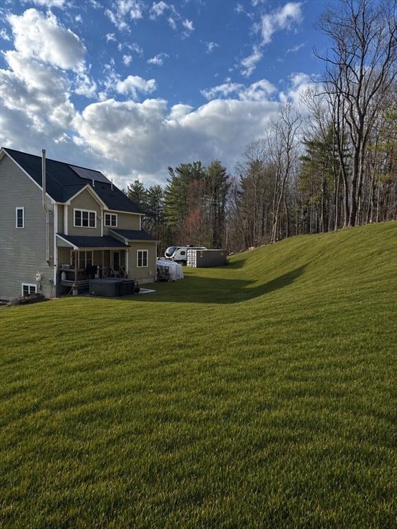 5 Deer Hill Road Oxford, MA 01537 - Photo 33 of 37 a view of a big house with a big yard and large trees