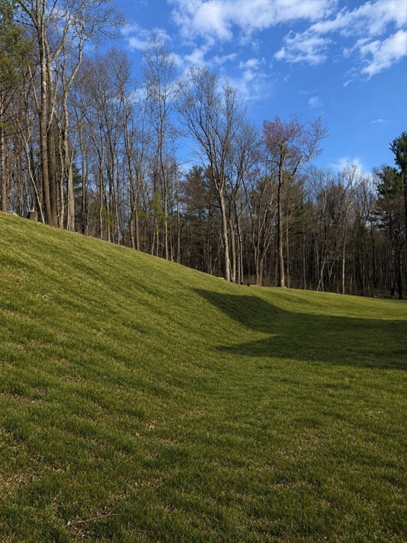 5 Deer Hill Road Oxford, MA 01537 - Photo 34 of 37 a backyard of a house with lots of green space