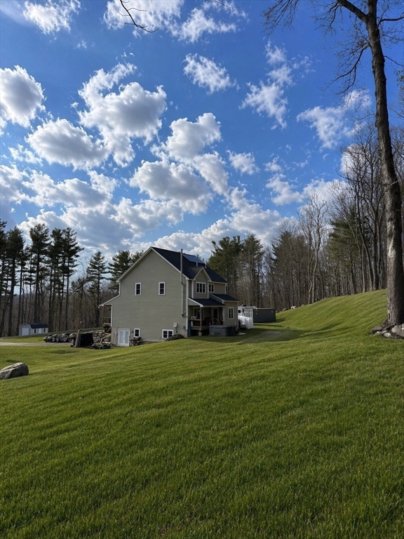 5 Deer Hill Road Oxford, MA 01537 - Photo 35 of 37 a view of a house with a big yard and a large trees