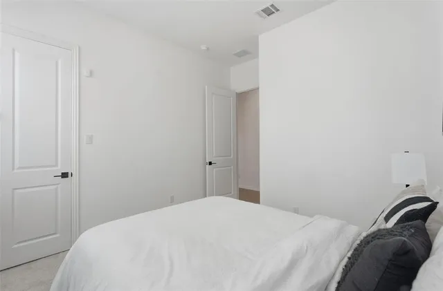 a bedroom with a bed