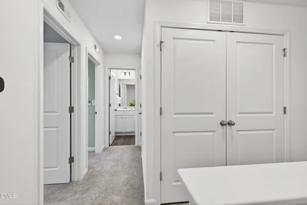 a view of a bathroom with a sink mirror and shower