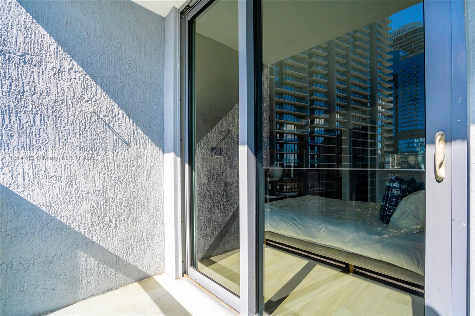 31 Southeast 6th Street, Unit 2205 Miami, FL 33131 - Photo 15 of 25 a view of swimming pool from a balcony