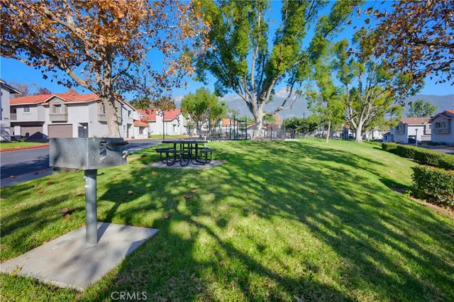 a view of a street with a building in the background