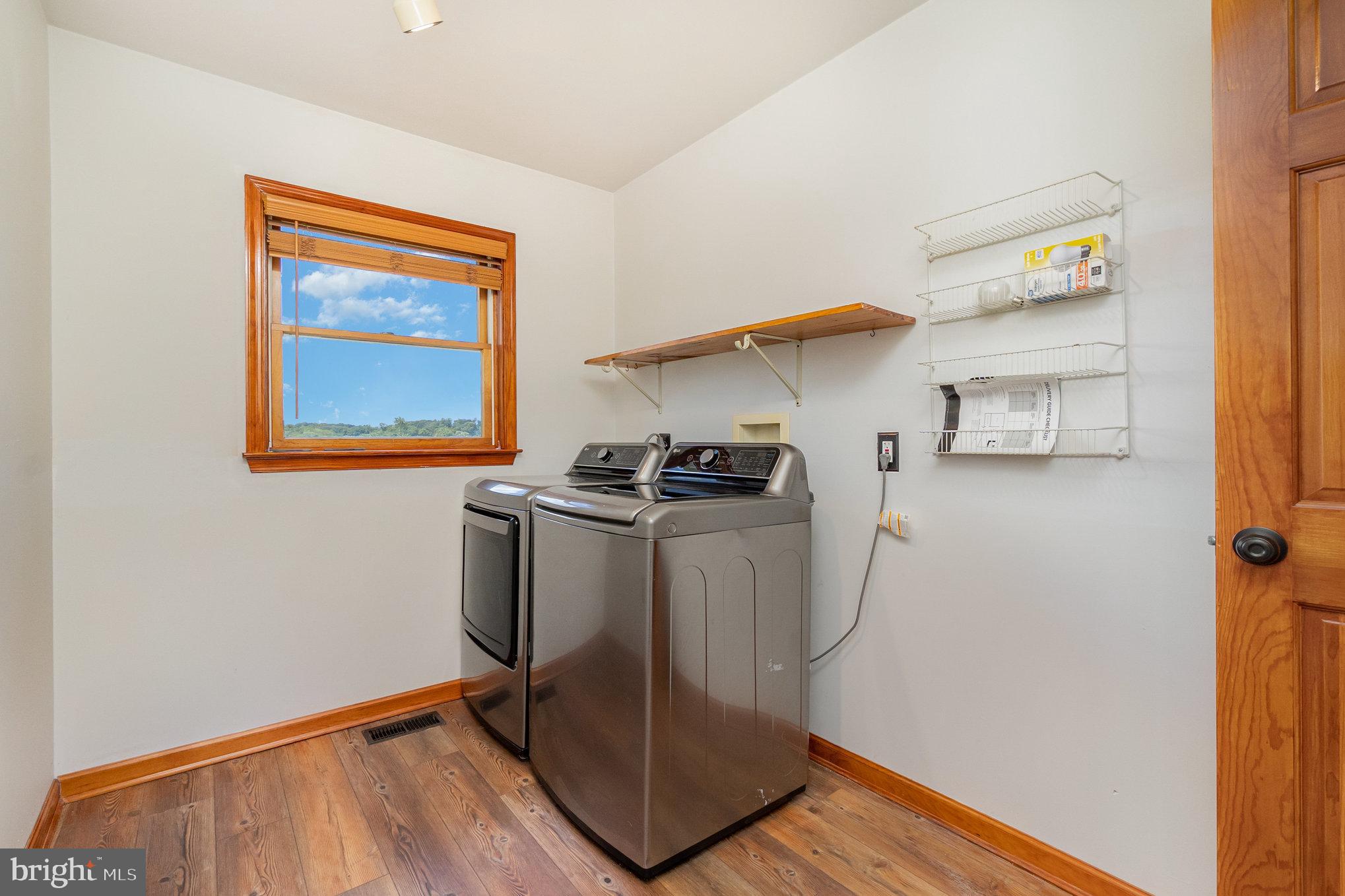 4816 Amos Road White Hall, MD 21161 - Photo 14 of 56 a utility room with dryer and washer