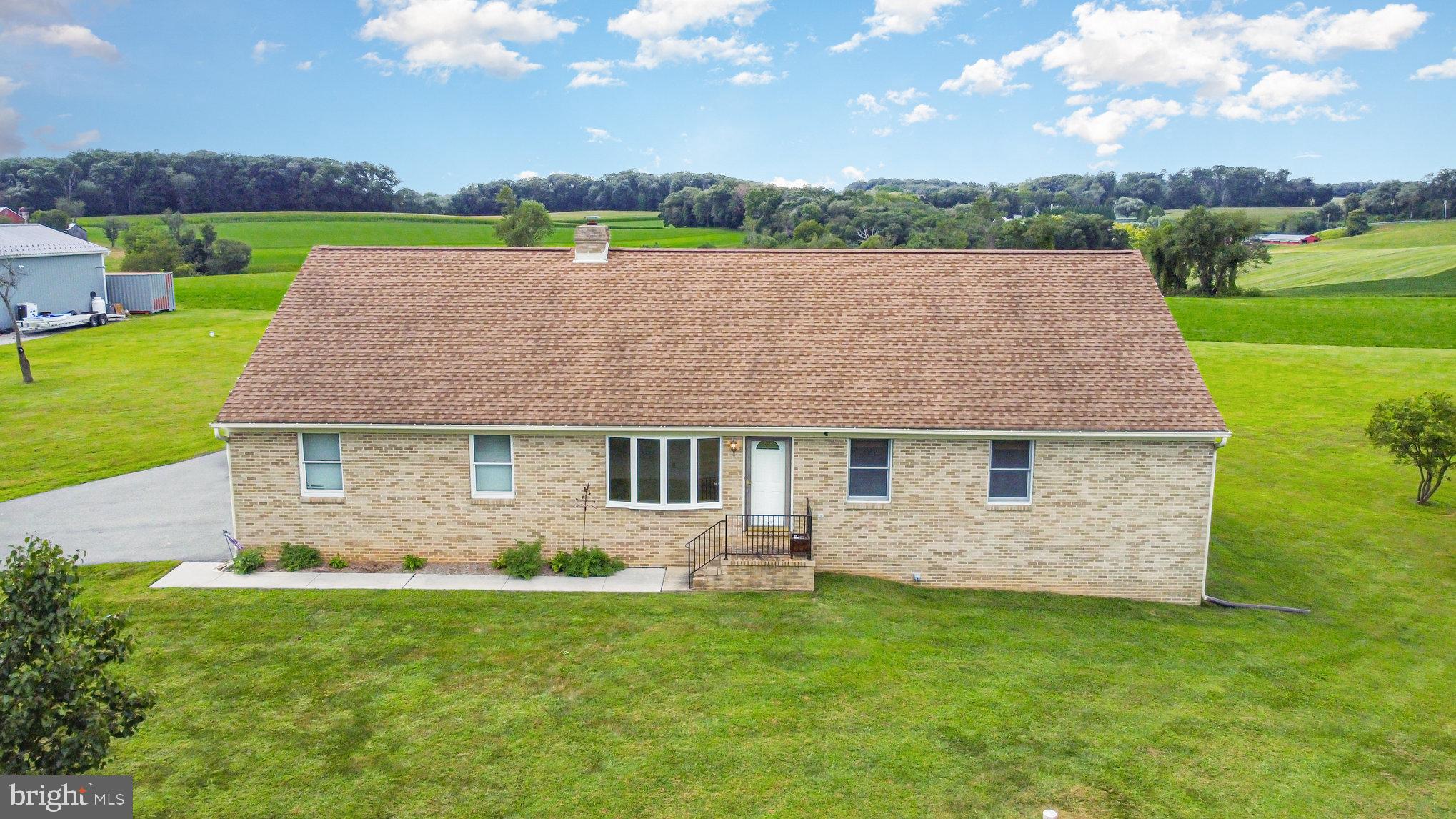 4816 Amos Road White Hall, MD 21161 - Photo 2 of 56 an aerial view of a house with a yard