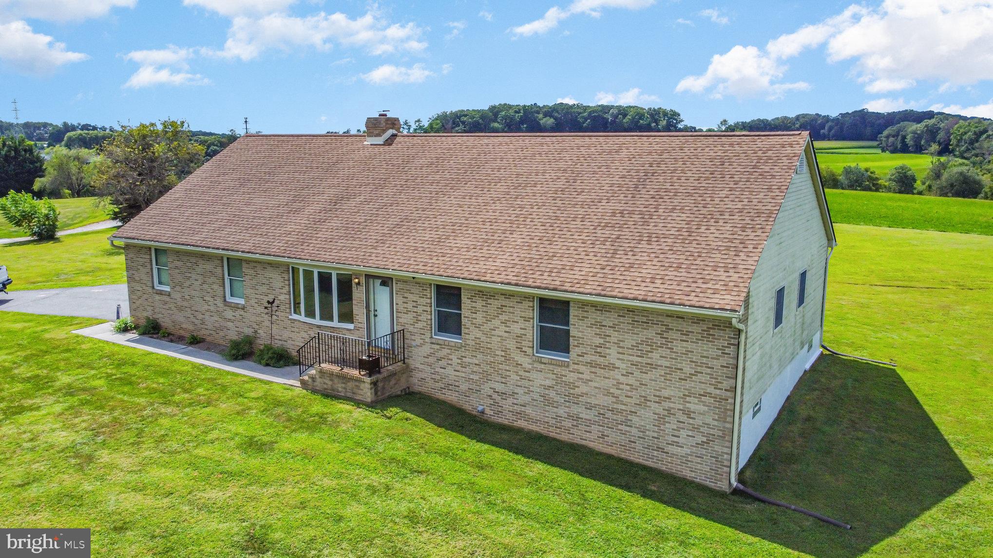 4816 Amos Road White Hall, MD 21161 - Photo 3 of 56 a aerial view of a house with a yard