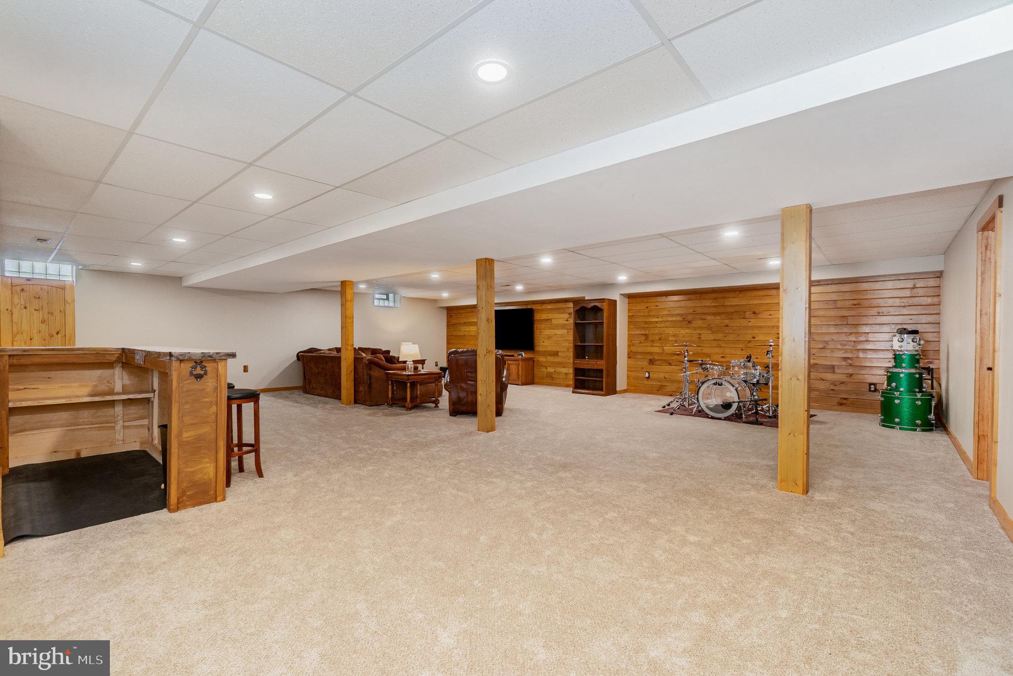 4816 Amos Road White Hall, MD 21161 - Photo 32 of 56 a big room with furniture and a large window