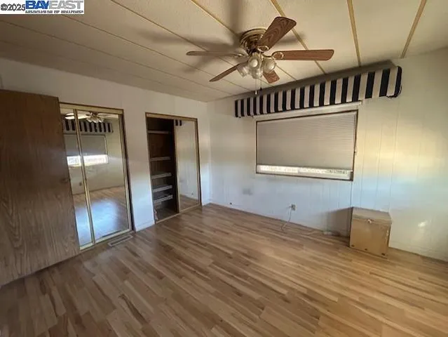 a view of an empty room with a chandelier