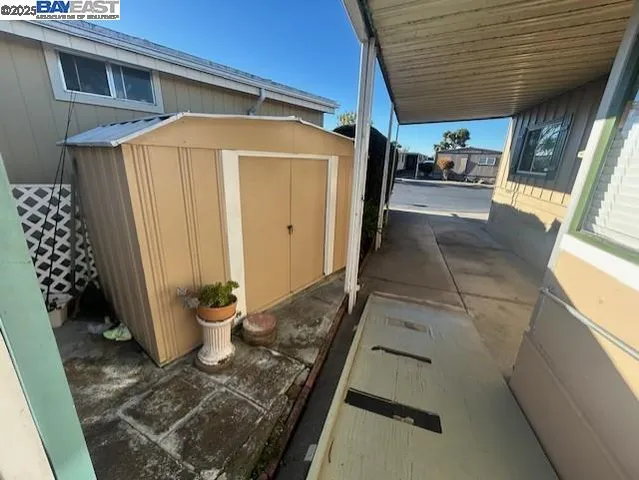 a view of a porch with furniture