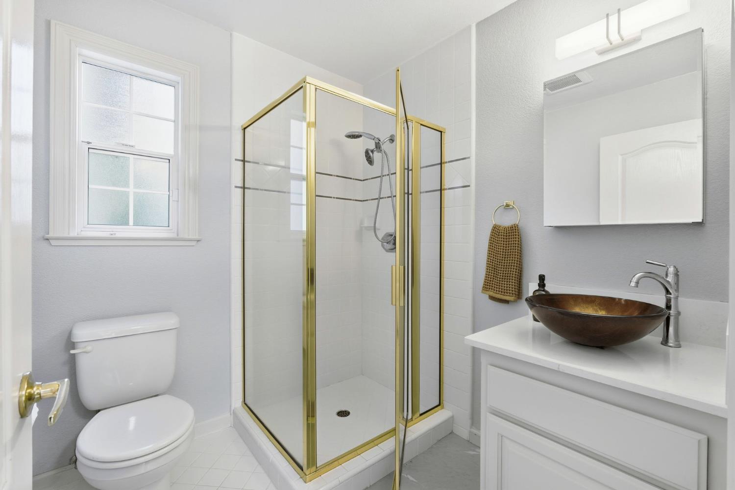 3723 Modoc Place Davis, CA 95618 - Photo 18 of 27 Second downstairs bathroom located off the laundry room