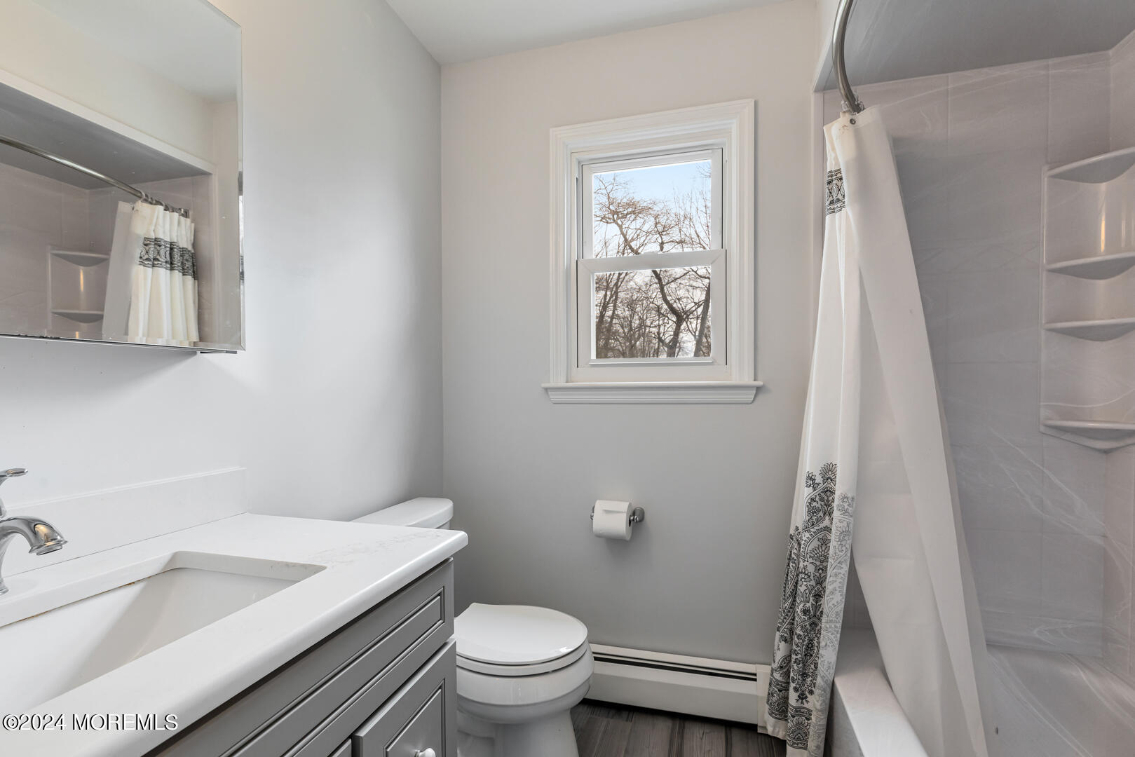 12 Bunkerhill Road Hazlet, NJ 07730 - Photo 12 of 27 a bathroom with a granite countertop sink toilet and shower