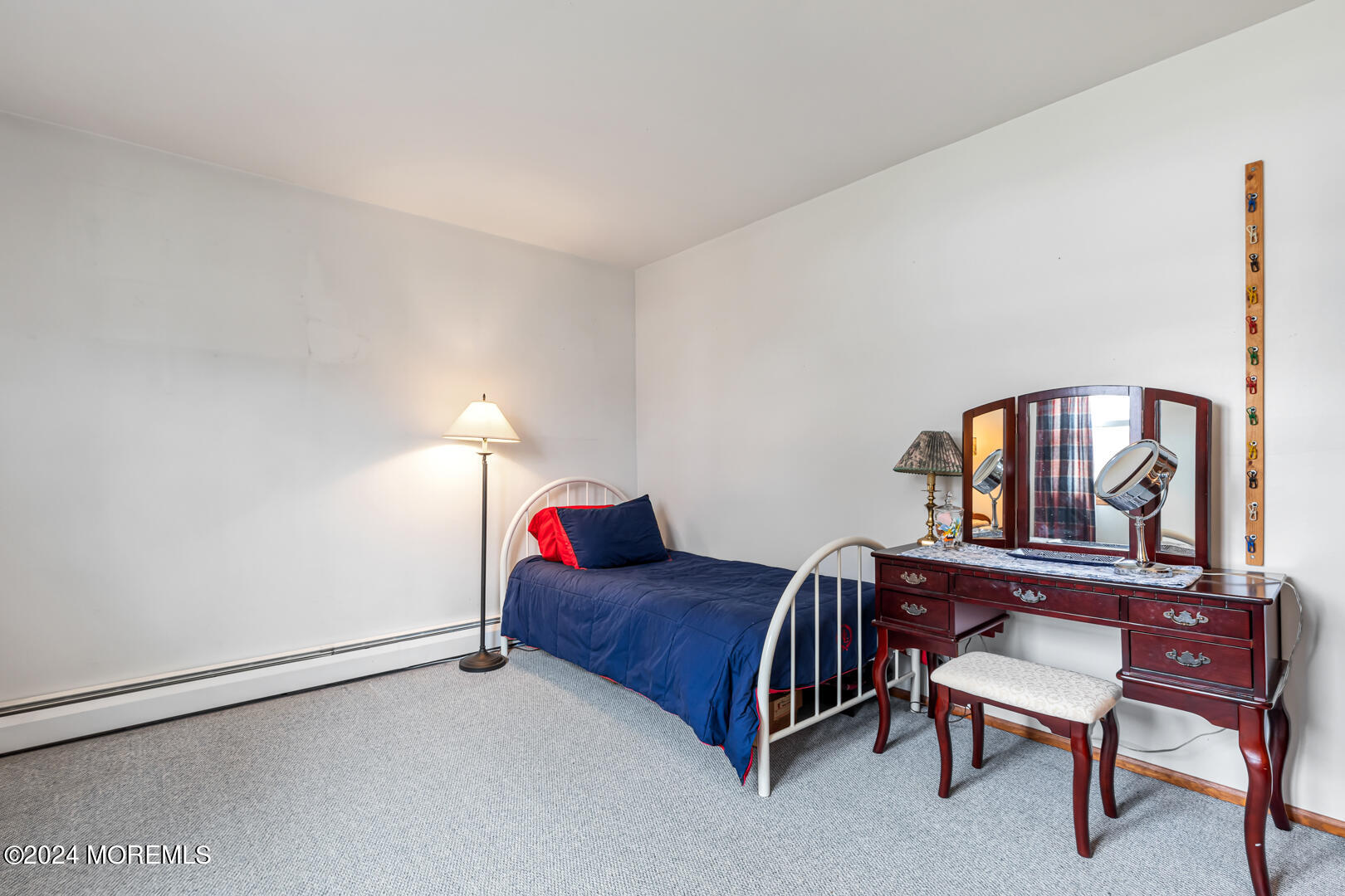 12 Bunkerhill Road Hazlet, NJ 07730 - Photo 14 of 27 a bedroom with a bed and a dresser