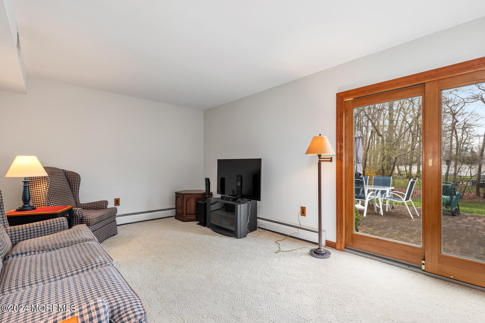12 Bunkerhill Road Hazlet, NJ 07730 - Photo 17 of 27 a bedroom with furniture and a flat screen tv