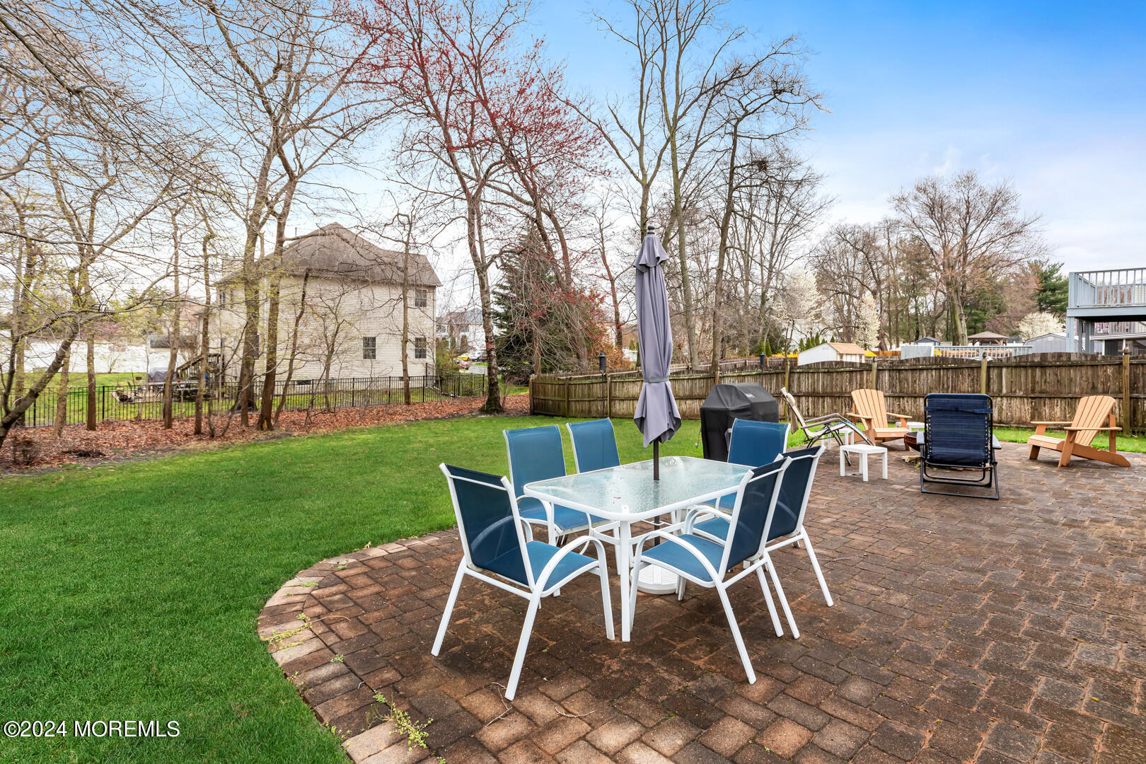 12 Bunkerhill Road Hazlet, NJ 07730 - Photo 19 of 27 a view of a yard with a table and chairs