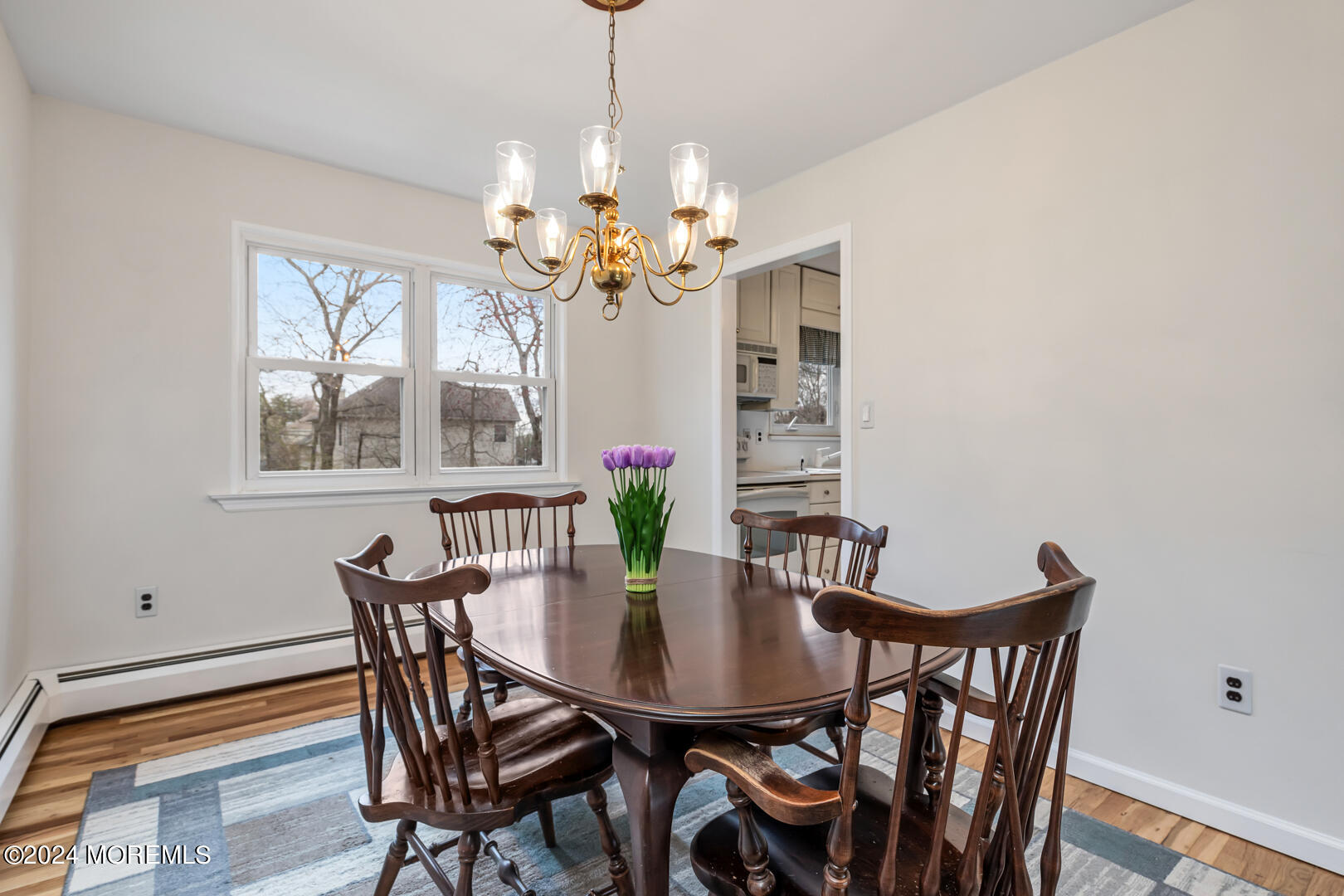 12 Bunkerhill Road Hazlet, NJ 07730 - Photo 5 of 27 a view of a dining room with furniture a chandelier and wooden floor