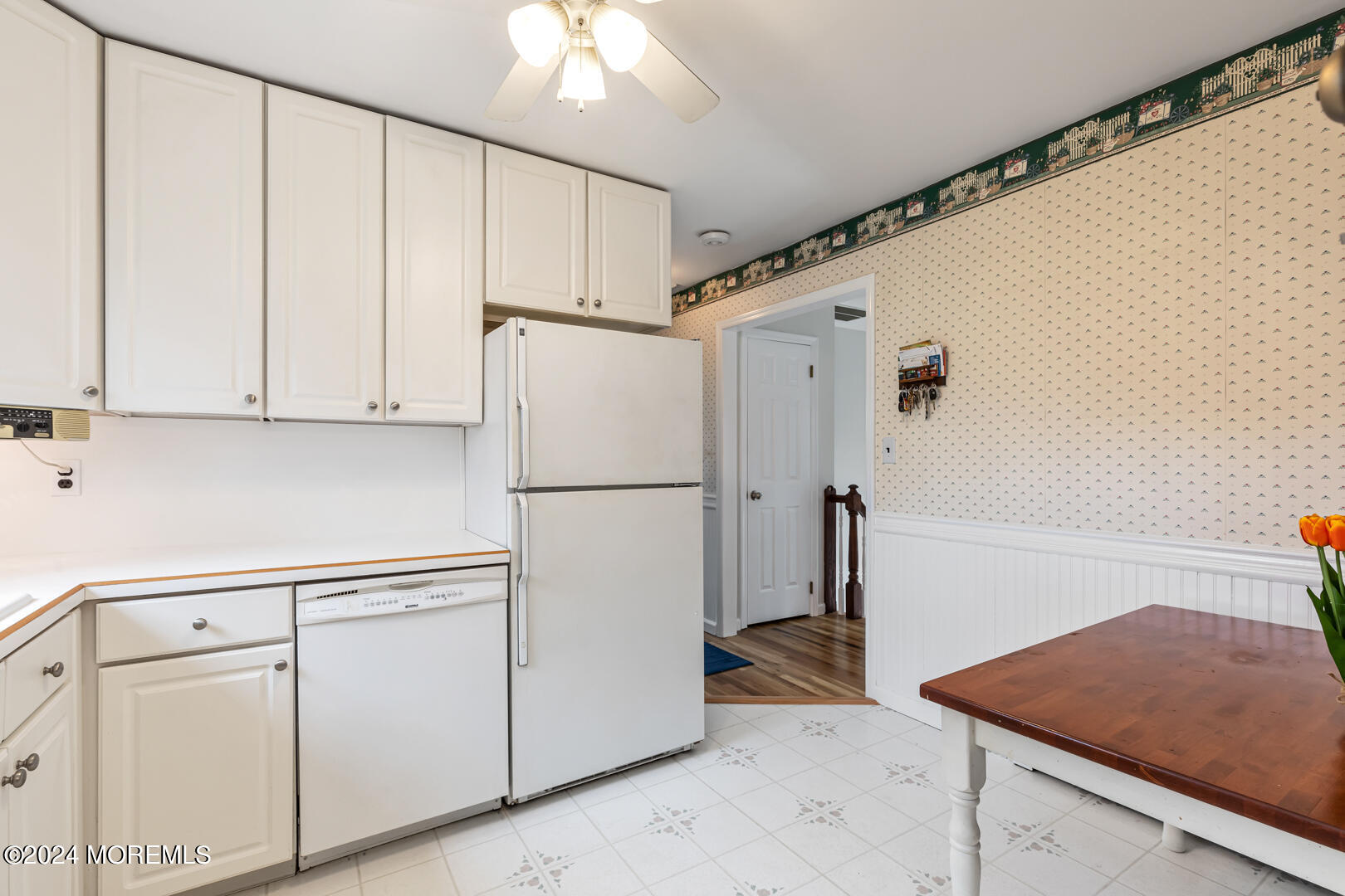 12 Bunkerhill Road Hazlet, NJ 07730 - Photo 9 of 27 a white refrigerator freezer and a stove sitting inside of a kitchen