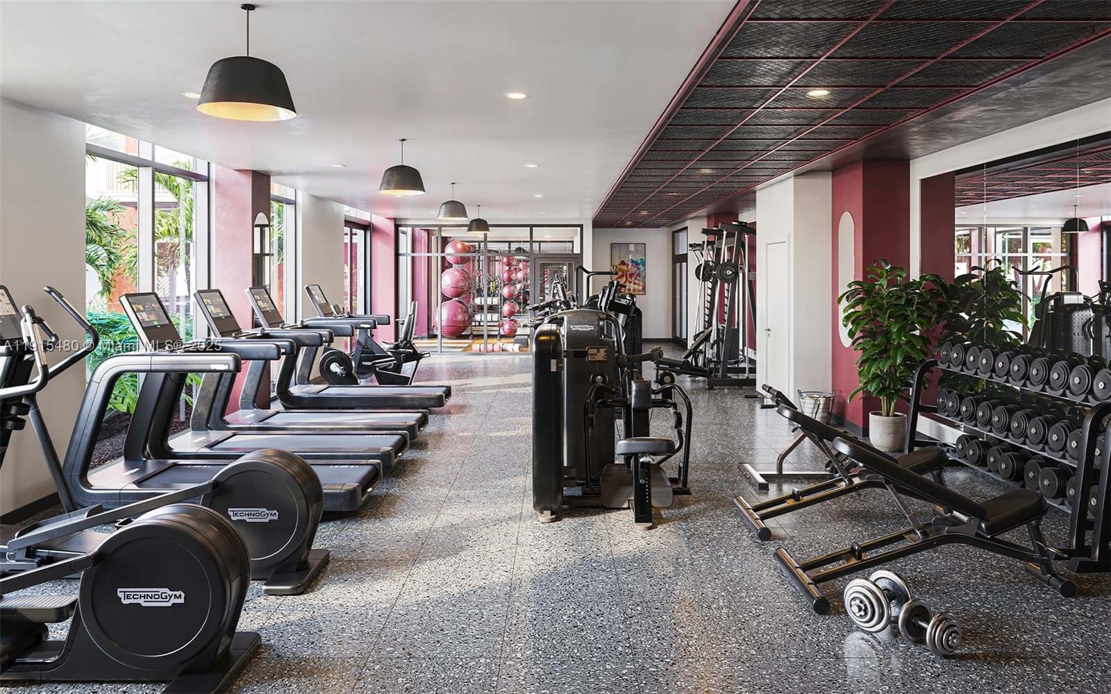 3830 Northwest 11th Street, Unit STUDIO Miami, FL 33126 - Photo 9 of 20 a view of a room with gym equipment