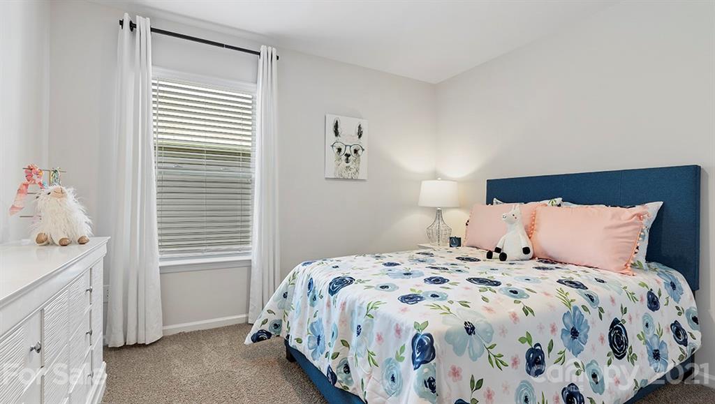 332 Gaines Road Clover, SC 29710 - Photo 25 of 32 a bedroom with a bed and a window