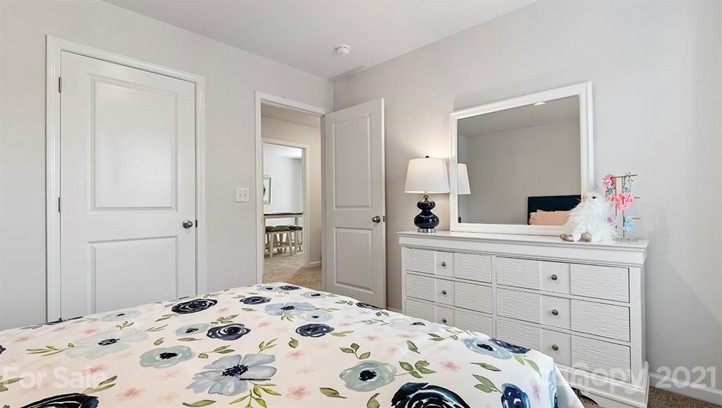 332 Gaines Road Clover, SC 29710 - Photo 26 of 32 a bedroom with a bed and a dresser