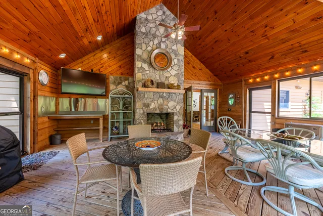 a view of a lush green hillside and a houses