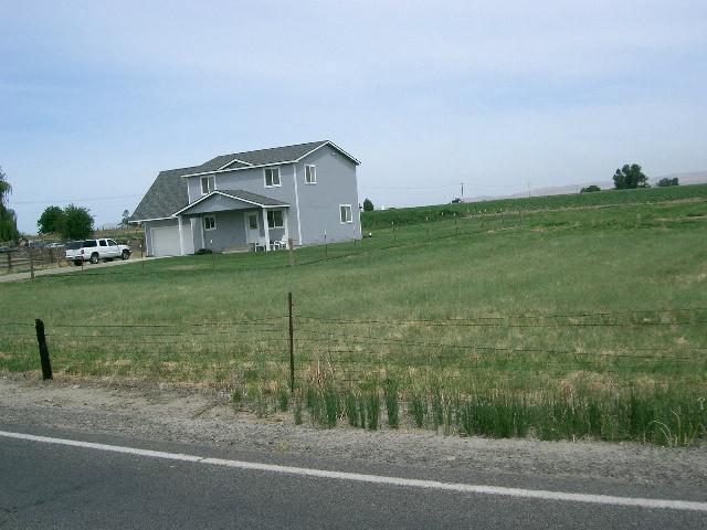 2481 Van Belle Road Outlook, WA 98938 - Photo 3 of 7 a front view of a house with a yard