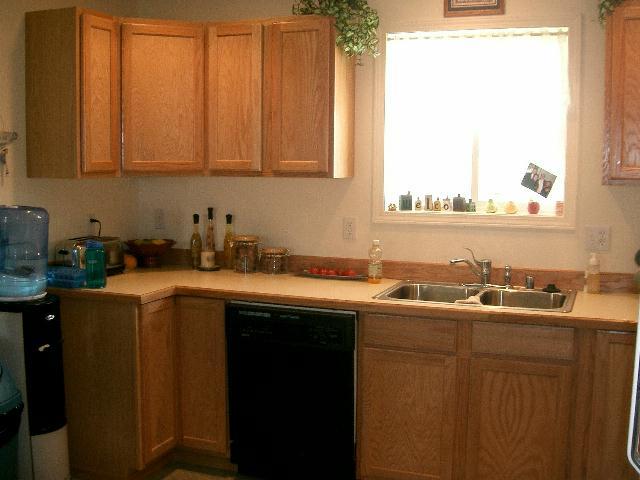 2481 Van Belle Road Outlook, WA 98938 - Photo 4 of 7 a kitchen with a sink a window and cabinets