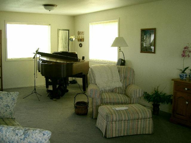 2481 Van Belle Road Outlook, WA 98938 - Photo 6 of 7 a living room with furniture and a piano