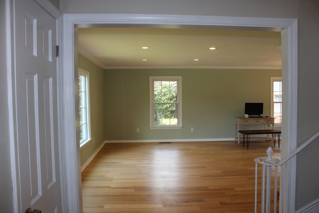 3710 Winkfield Place Columbus, GA 31909 - Photo 13 of 98 a view of empty room with wooden floor and fan