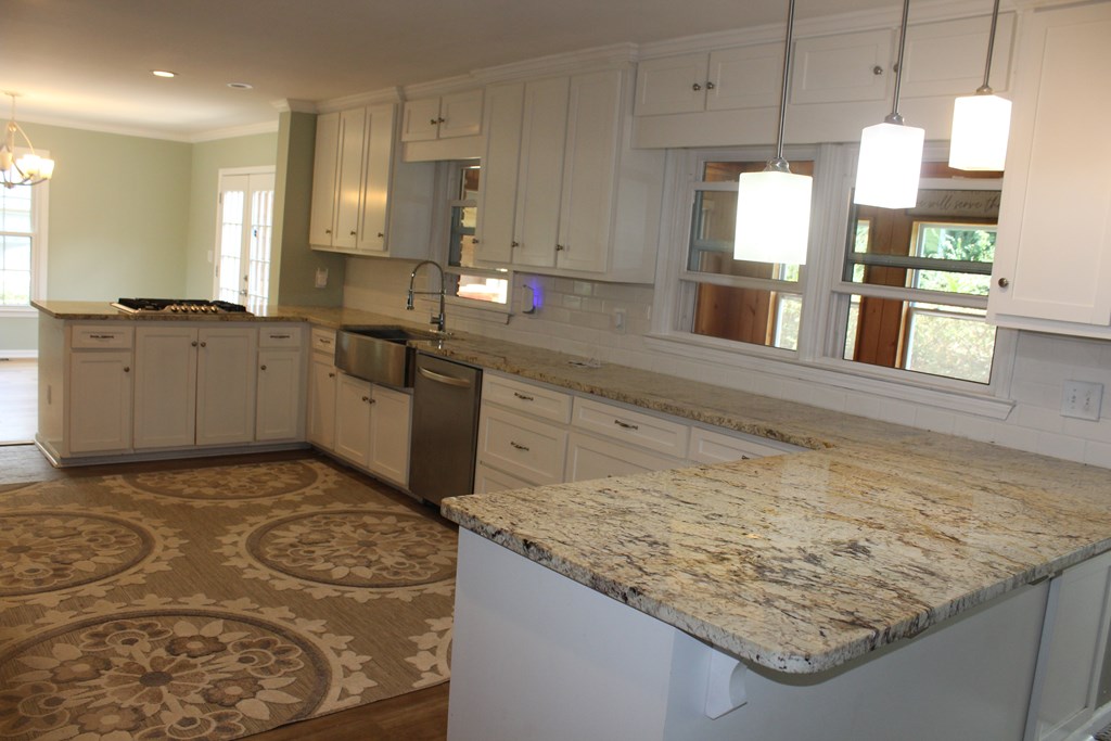 3710 Winkfield Place Columbus, GA 31909 - Photo 20 of 98 a kitchen with a sink stove and cabinets