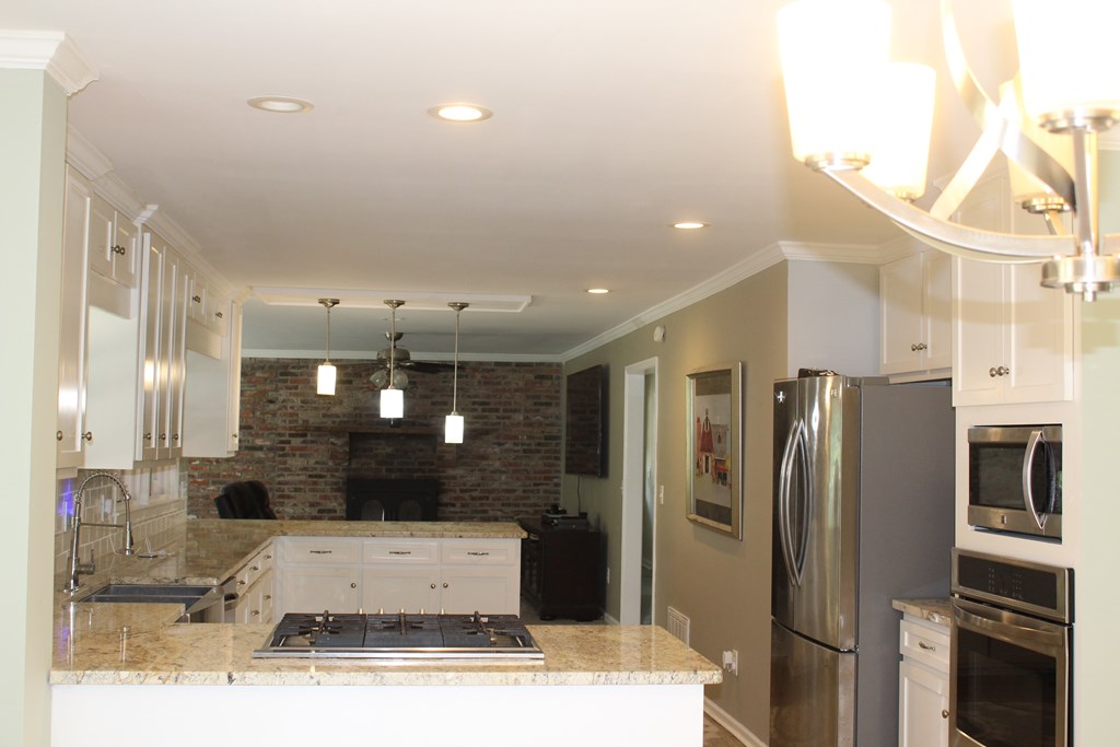 3710 Winkfield Place Columbus, GA 31909 - Photo 24 of 98 a view of kitchen with stainless steel appliances kitchen island a refrigerator and a stove