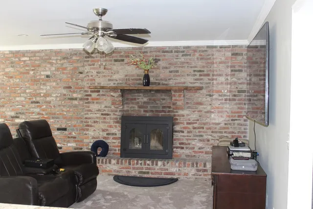 a bathroom with a shower and a sink