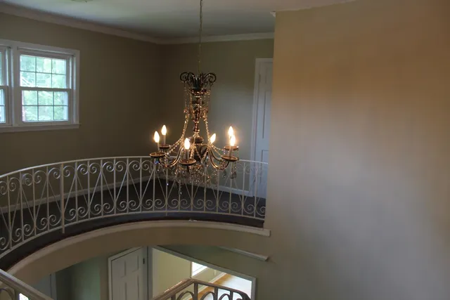 a backyard of a house with lots of green space