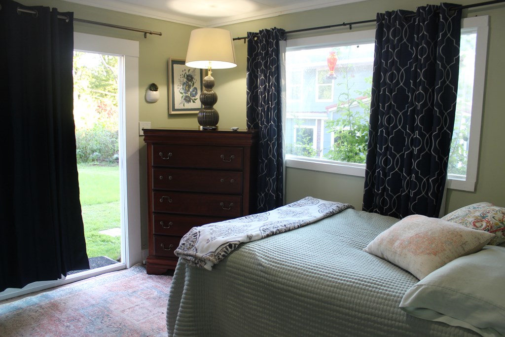 3710 Winkfield Place Columbus, GA 31909 - Photo 74 of 98 a bedroom with a bed and large windows