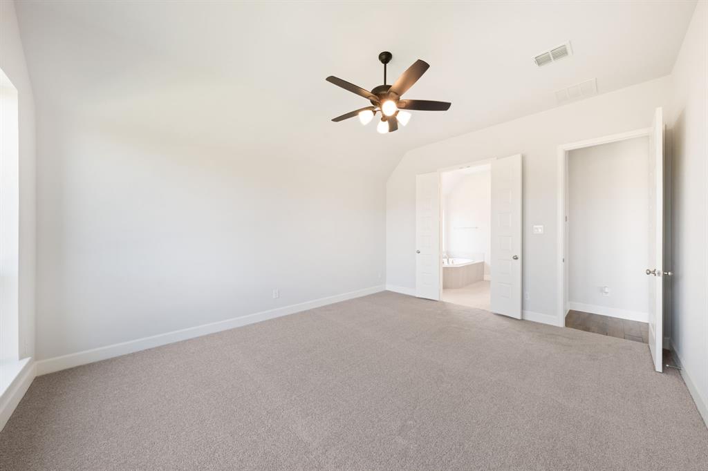 721 Running Iron Trail Mansfield, TX 76063 - Photo 10 of 23 wooden floor in an empty room