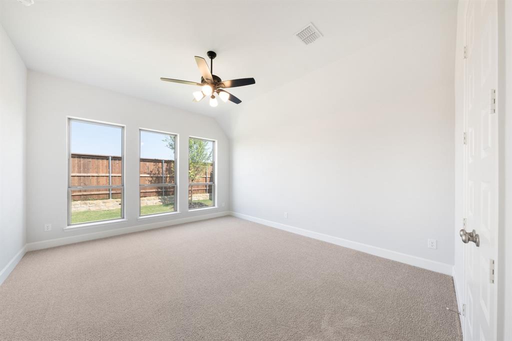 721 Running Iron Trail Mansfield, TX 76063 - Photo 11 of 23 a view of empty room with windows