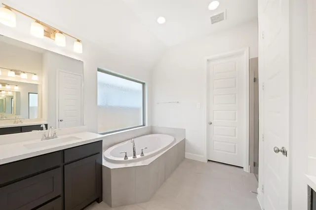 a view of empty room with windows