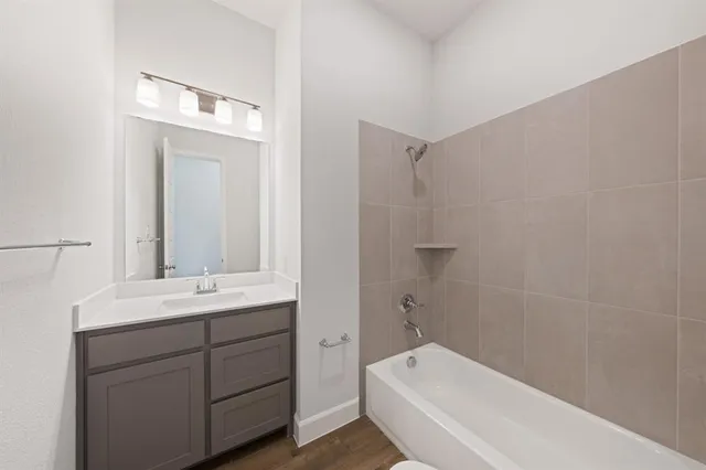 a view of empty room with windows