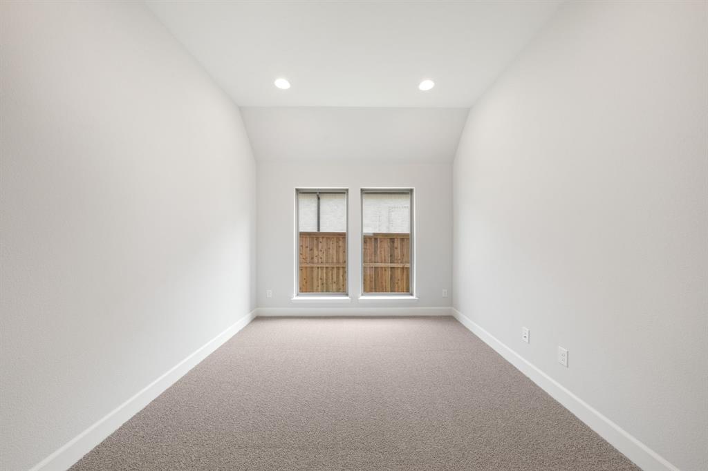 721 Running Iron Trail Mansfield, TX 76063 - Photo 19 of 23 a view of an empty room with a window