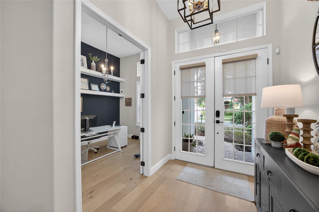11550 Delwick Drive Windermere, FL 34786 - Photo 11 of 91 a view of a livingroom with furniture and front door